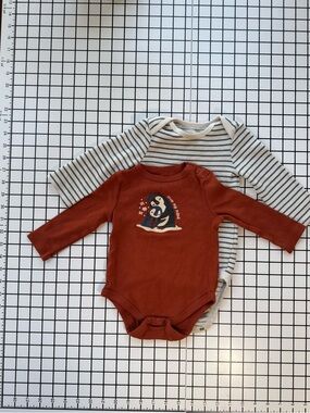 Rust Penguin Graphic Baby One-Piece Bodysuit - Long Sleeve